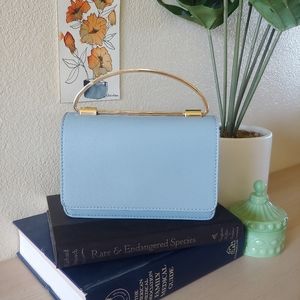 Maddisen West structured blue purse with crossbody strap